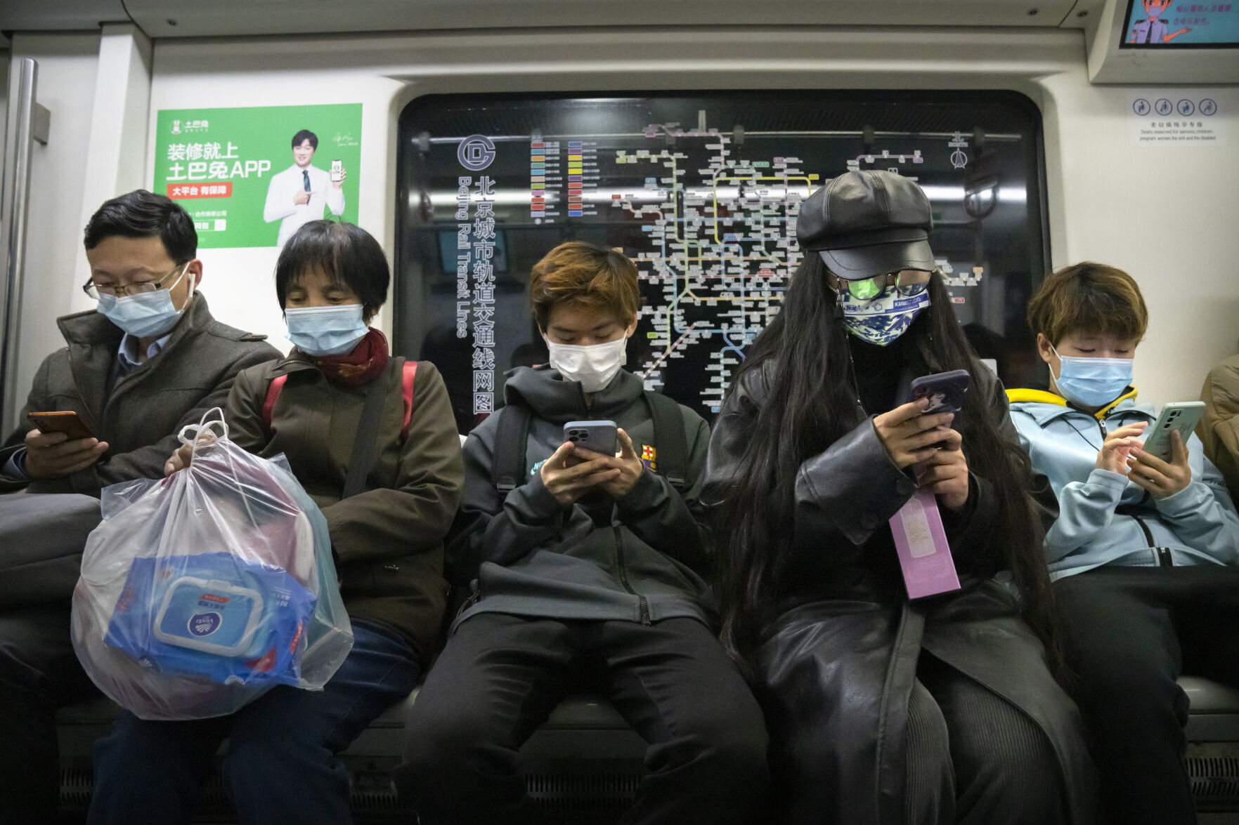 APTOPIX Virus Outbreak China Daily Life